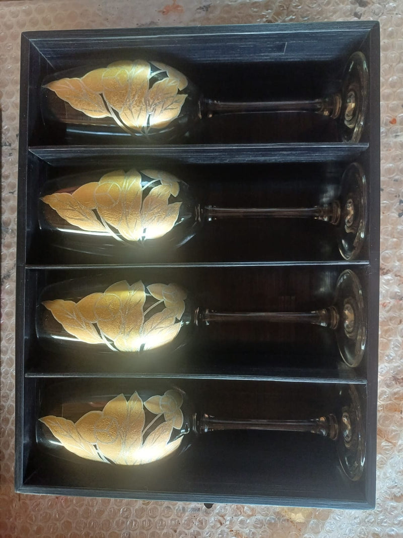 Bespoke set of four champagne flutes with hand-applied 24k gold leaf — Explorer's Tales commission by Stocker Studio