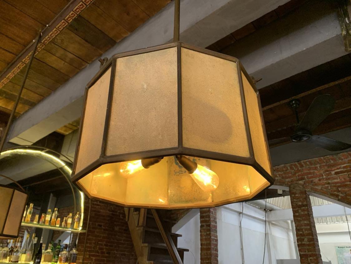 Octagonal lacquer pendant lamp aged in situ — built over thirty layers of natural lacquer by Stocker Studio