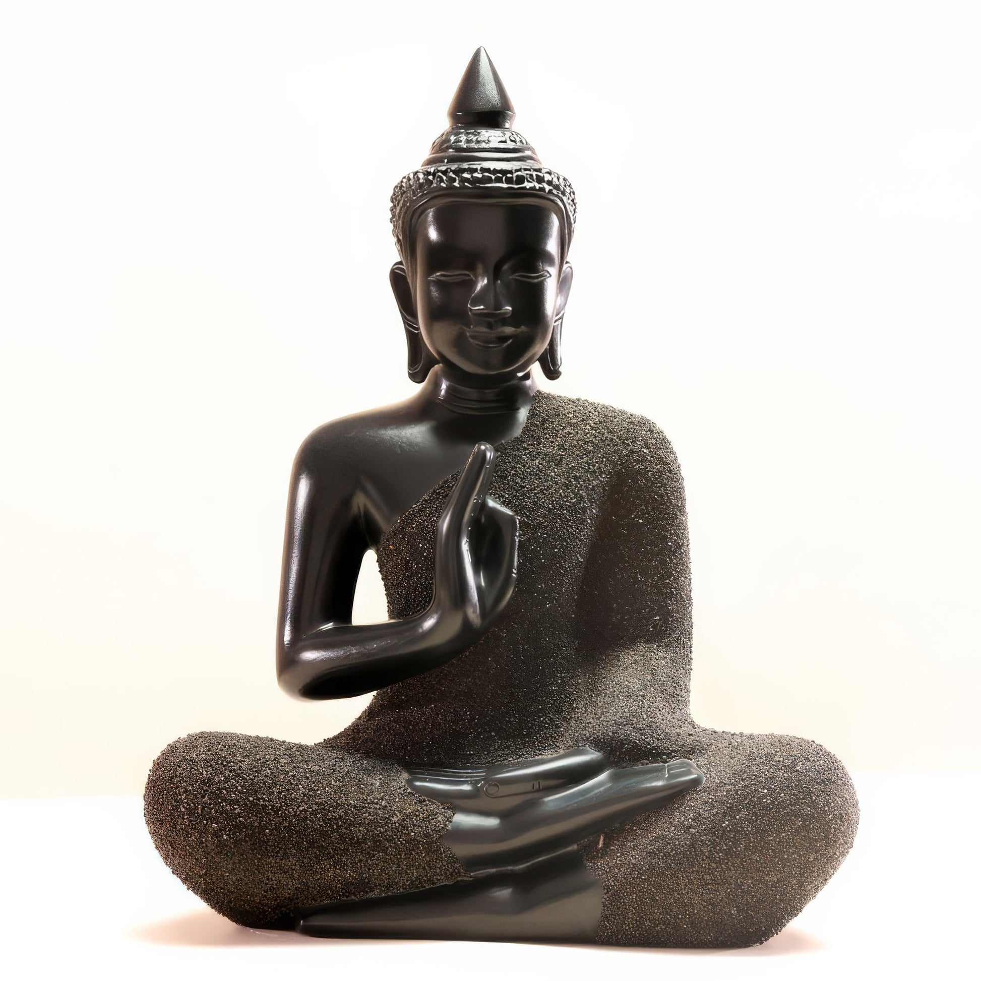 Meditating Buddha sculpture in textured sand-finish lacquer with smooth black face and hands — Stocker Studio, Siem Reap