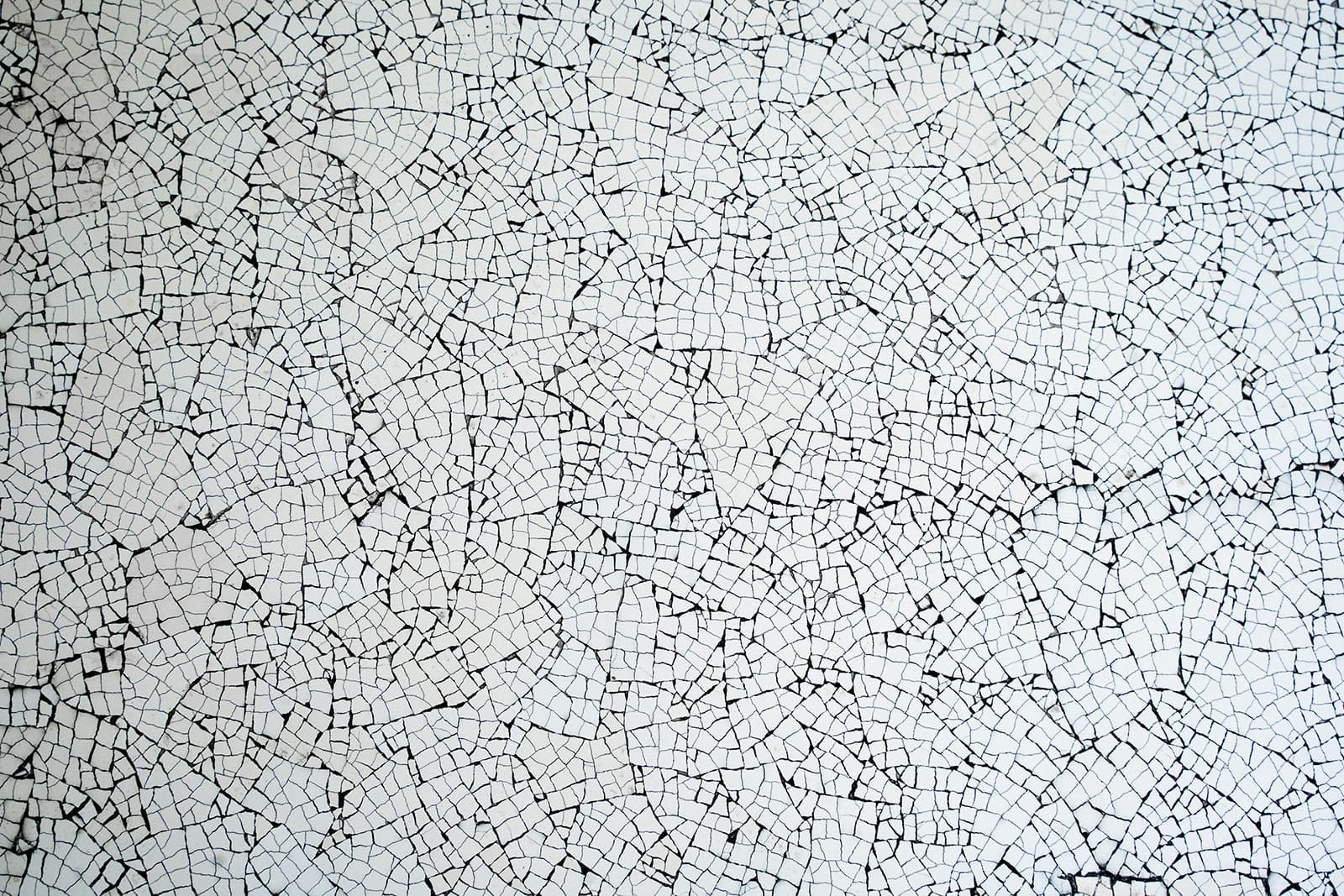 Close-up detail of hand-laid white eggshell mosaic — Stocker Studio Console Eggshell Band