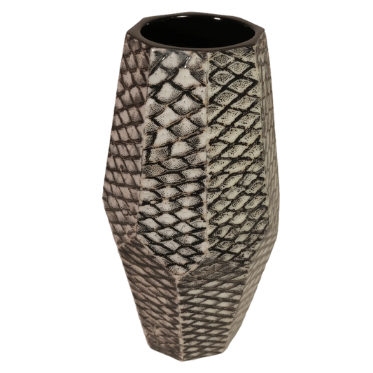 Decorative vase with geometric pattern on a white background made with carp skin and lacquer